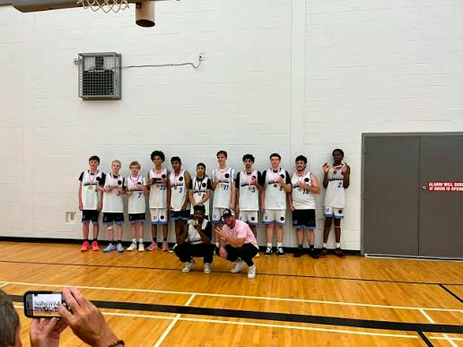 The 902 Scotian Sports team posing with medals after a game